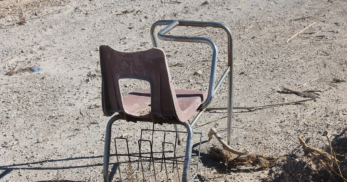An abandoned school desk found in an empty lot in Las Vegas, Nevada.